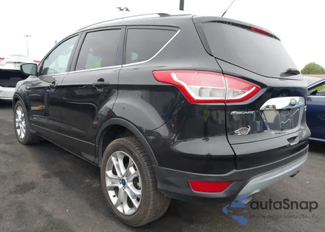 2015 Ford Escape Titanium z USA, uszkodzony, nr VIN 1FMCU0JX2FUC20718